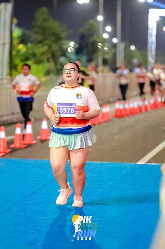 Race photo from PIK NITE RUN 2025
