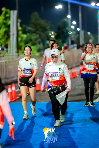 Race photo from PIK NITE RUN 2025
