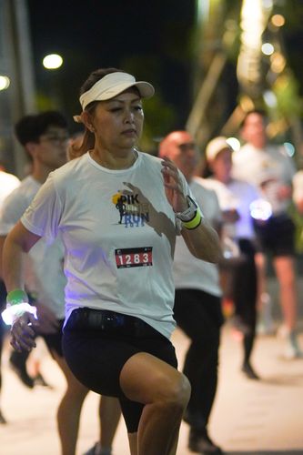 Race photo from PIK NITE RUN VIBES