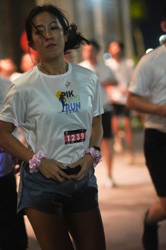 Race photo from PIK NITE RUN VIBES