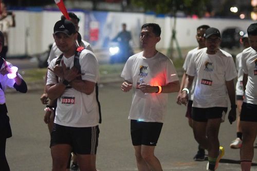 Race photo from PIK NITE RUN VIBES
