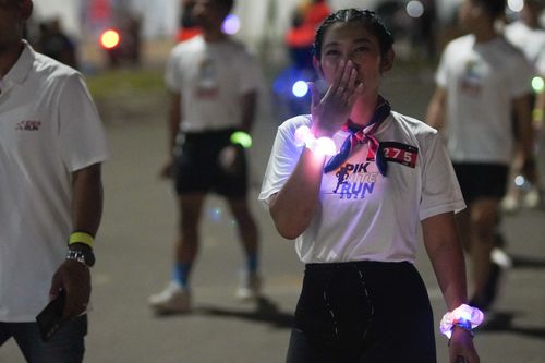Race photo from PIK NITE RUN VIBES