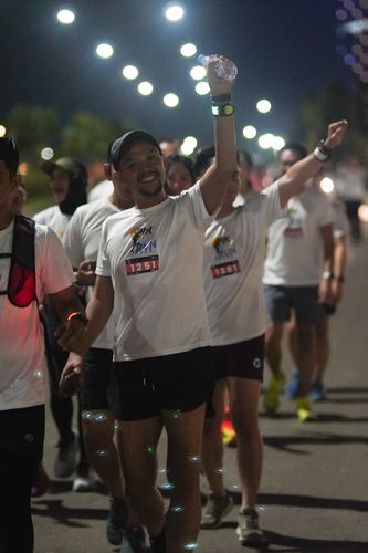 Race photo from PIK NITE RUN VIBES