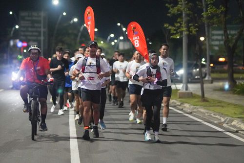 Race photo from PIK NITE RUN VIBES