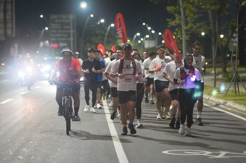 Race photo from PIK NITE RUN VIBES