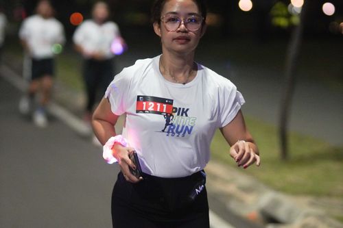 Race photo from PIK NITE RUN VIBES