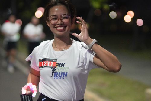 Race photo from PIK NITE RUN VIBES