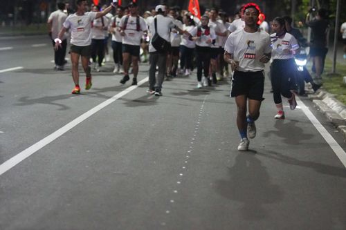 Race photo from PIK NITE RUN VIBES