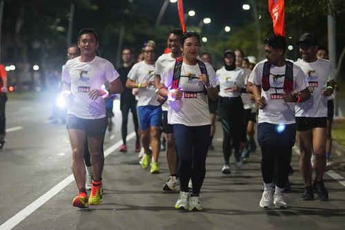 Race photo from PIK NITE RUN VIBES