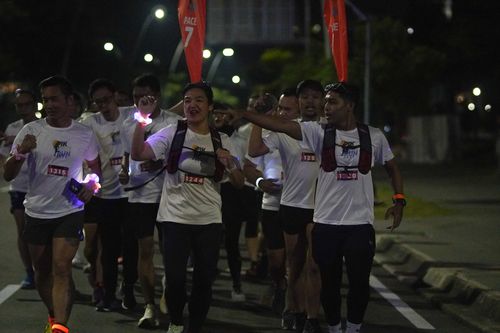 Race photo from PIK NITE RUN VIBES