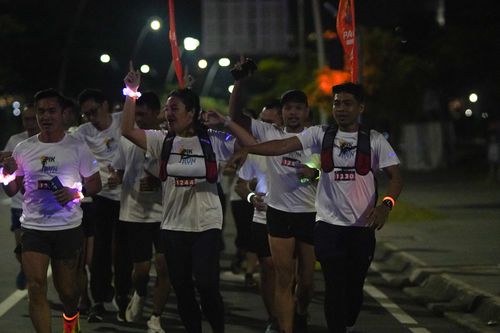 Race photo from PIK NITE RUN VIBES