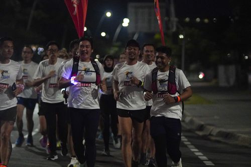 Race photo from PIK NITE RUN VIBES