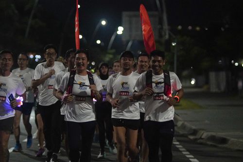 Race photo from PIK NITE RUN VIBES