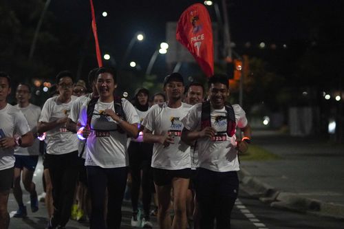 Race photo from PIK NITE RUN VIBES