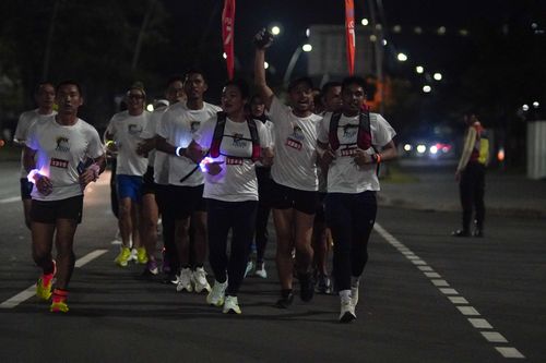 Race photo from PIK NITE RUN VIBES
