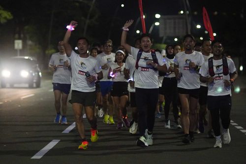 Race photo from PIK NITE RUN VIBES