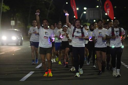 Race photo from PIK NITE RUN VIBES