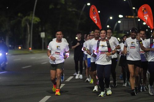 Race photo from PIK NITE RUN VIBES