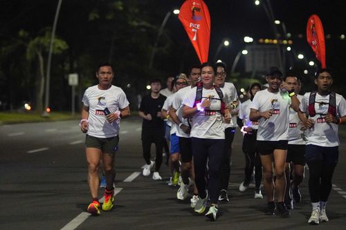 Race photo from PIK NITE RUN VIBES