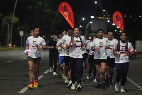 Race photo from PIK NITE RUN VIBES