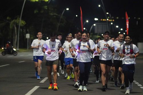 Race photo from PIK NITE RUN VIBES