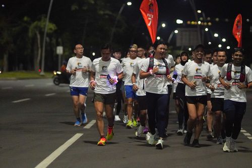 Race photo from PIK NITE RUN VIBES