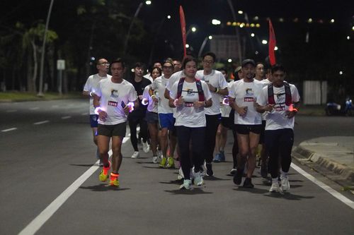 Race photo from PIK NITE RUN VIBES