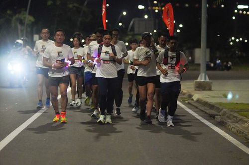 Race photo from PIK NITE RUN VIBES