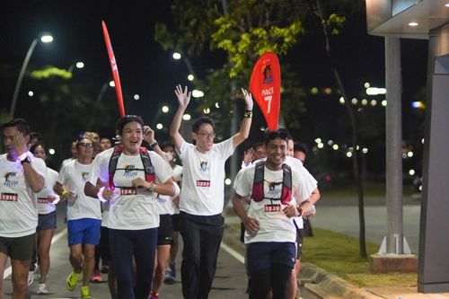 Race photo from PIK NITE RUN VIBES