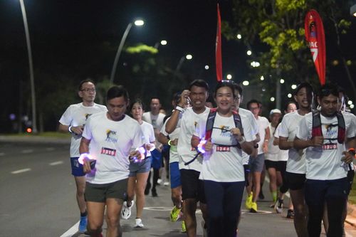 Race photo from PIK NITE RUN VIBES