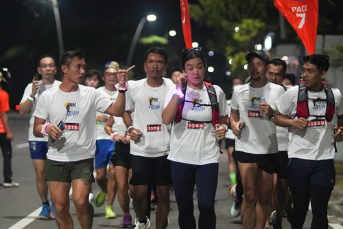 Race photo from PIK NITE RUN VIBES