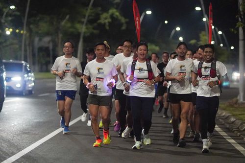 Race photo from PIK NITE RUN VIBES