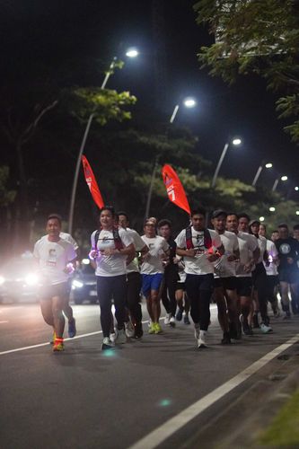 Race photo from PIK NITE RUN VIBES