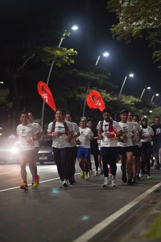 Race photo from PIK NITE RUN VIBES