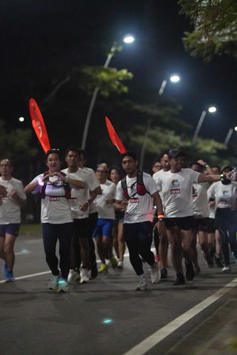 Race photo from PIK NITE RUN VIBES