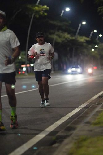 Race photo from PIK NITE RUN VIBES