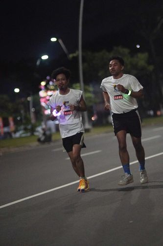 Race photo from PIK NITE RUN VIBES
