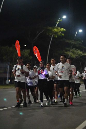 Race photo from PIK NITE RUN VIBES