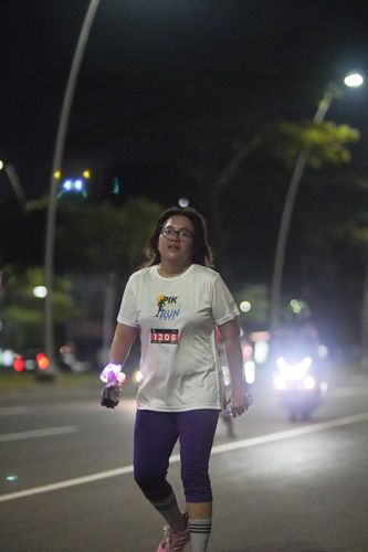 Race photo from PIK NITE RUN VIBES
