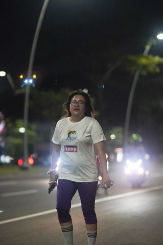 Race photo from PIK NITE RUN VIBES