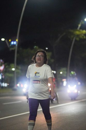 Race photo from PIK NITE RUN VIBES
