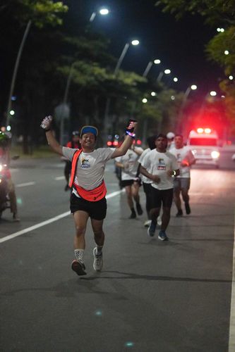 Race photo from PIK NITE RUN VIBES