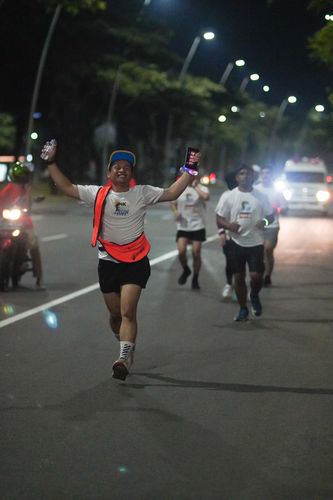 Race photo from PIK NITE RUN VIBES