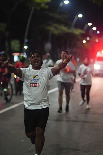 Race photo from PIK NITE RUN VIBES