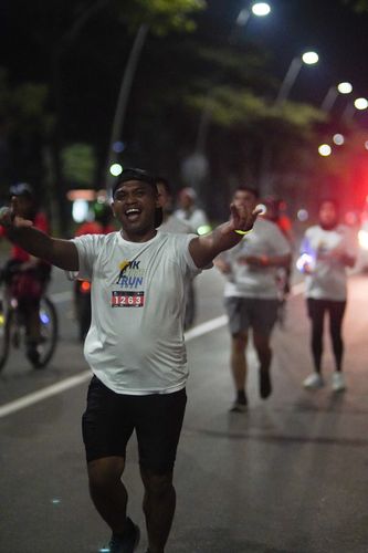 Race photo from PIK NITE RUN VIBES