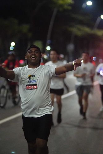 Race photo from PIK NITE RUN VIBES
