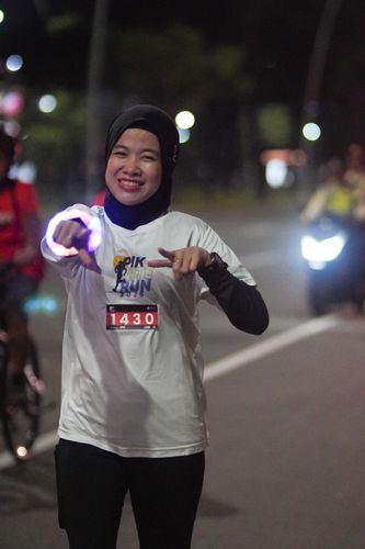Race photo from PIK NITE RUN VIBES