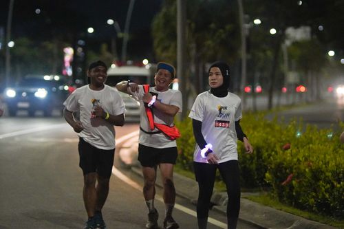 Race photo from PIK NITE RUN VIBES