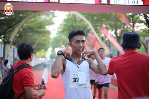 Race photo from Kediri Half Marathon 2024