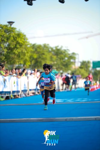 Race photo from PIK NITE RUN 2025